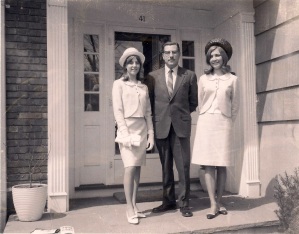 Father and daughters at the front door.  The Eisenhauer Years had lapsed into the Kennedy Years